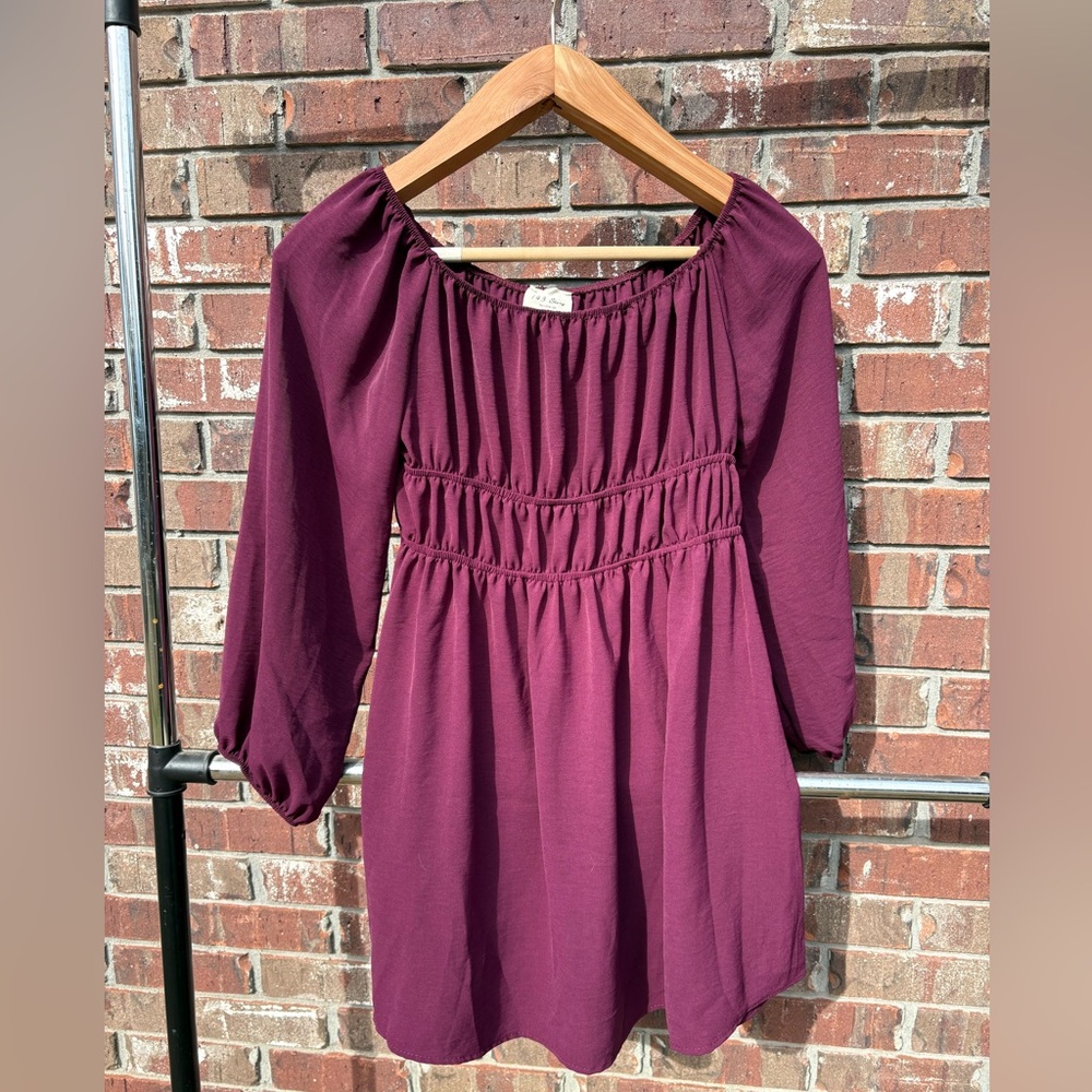 Purple mid length dress with peasant sleeves